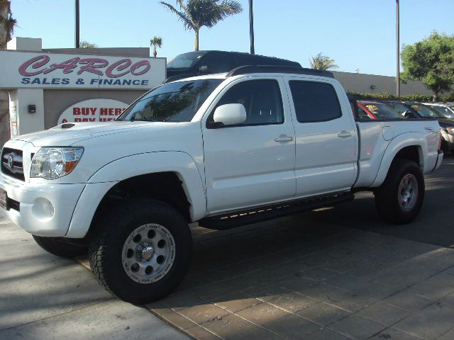 2005 Toyota Tacoma 2011 Kia SX