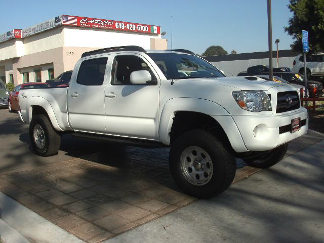 2005 Toyota Tacoma 2011 Kia SX