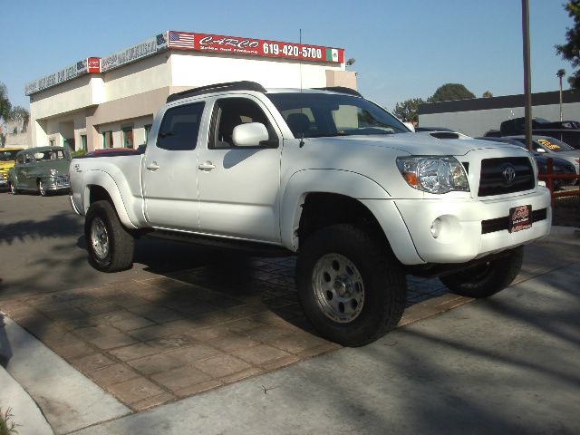 2005 Toyota Tacoma 2011 Kia SX