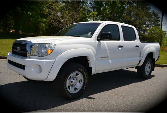 2006 Toyota Tacoma 2011 Kia SX