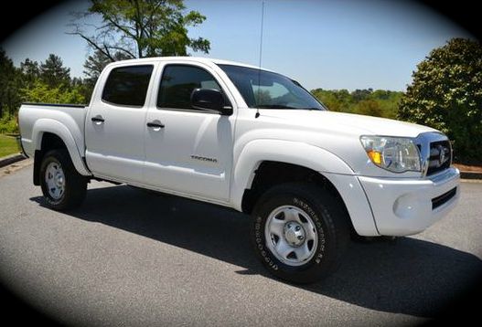 2006 Toyota Tacoma 2011 Kia SX