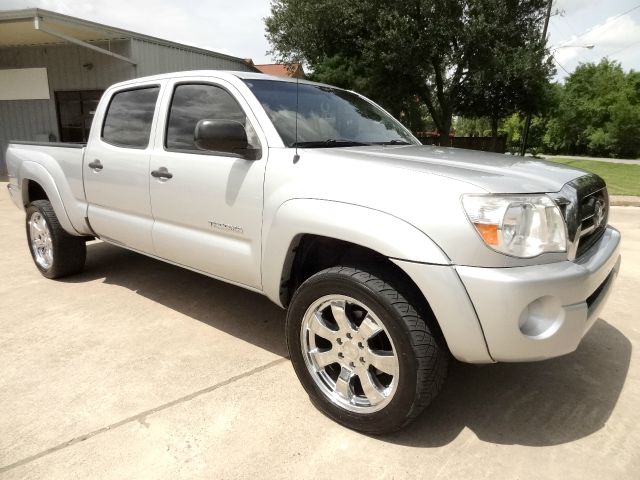 2006 Toyota Tacoma 2011 Kia SX