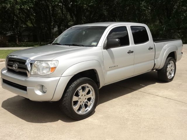 2006 Toyota Tacoma 2011 Kia SX