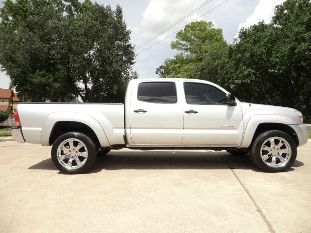 2006 Toyota Tacoma 2011 Kia SX