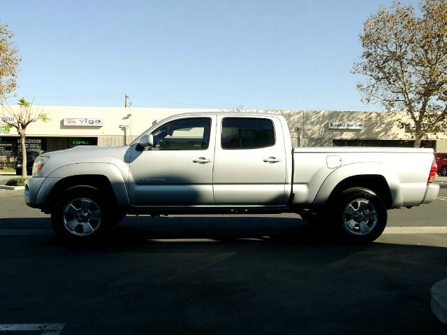 2007 Toyota Tacoma 2011 Kia SX