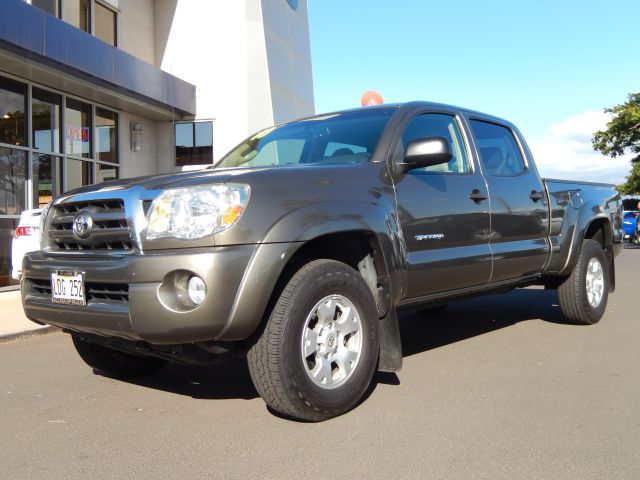 2010 Toyota Tacoma 2011 Kia SX