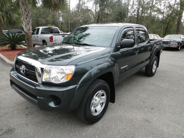 2011 Toyota Tacoma 2011 Kia SX