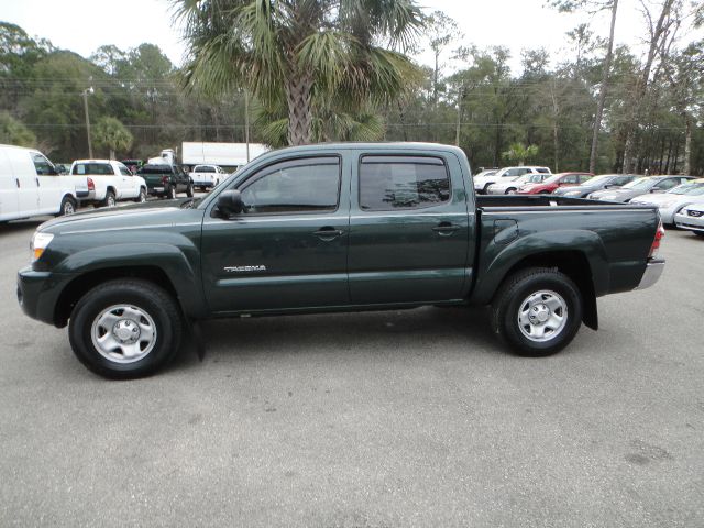 2011 Toyota Tacoma 2011 Kia SX