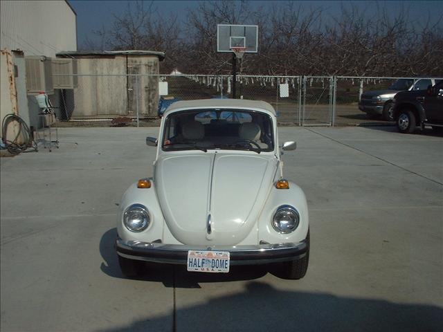 1977 Volkswagen Beetle 2002 Nissan