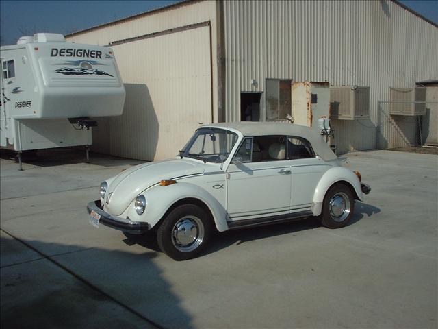 1977 Volkswagen Beetle 2002 Nissan