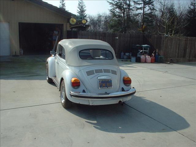 1977 Volkswagen Beetle 2002 Nissan