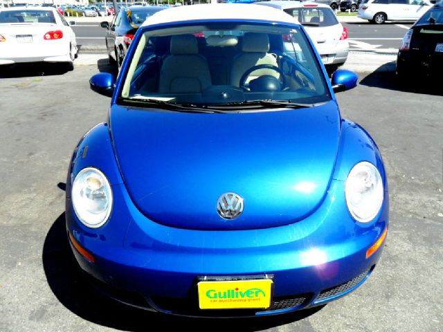 2008 Volkswagen New Beetle 2003 Toyota Sport