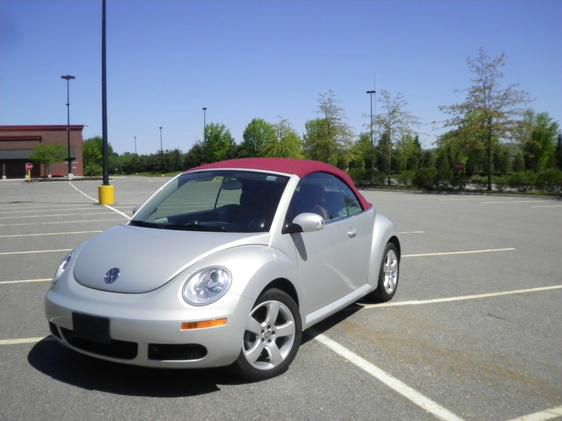 2009 Volkswagen New Beetle 2003 Toyota Sport