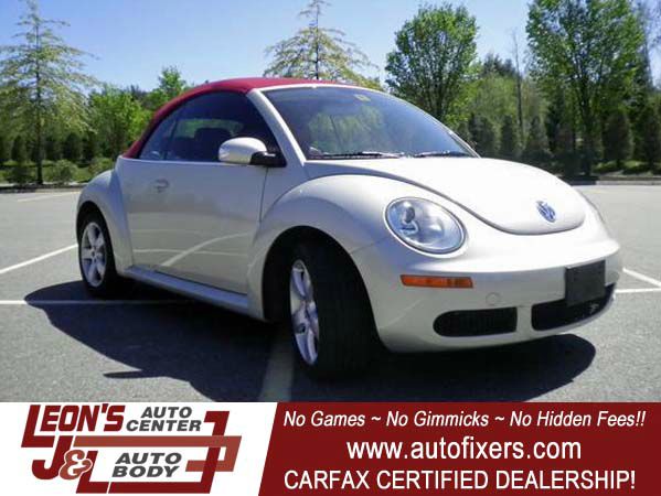 2009 Volkswagen New Beetle 2003 Toyota Sport