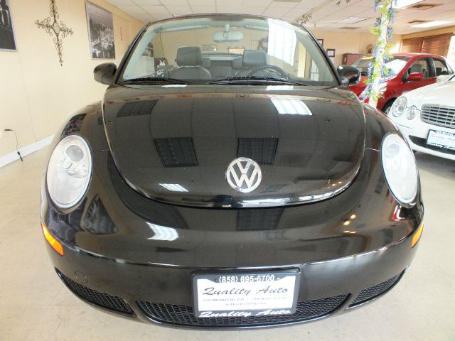 2009 Volkswagen New Beetle 2003 Toyota Sport